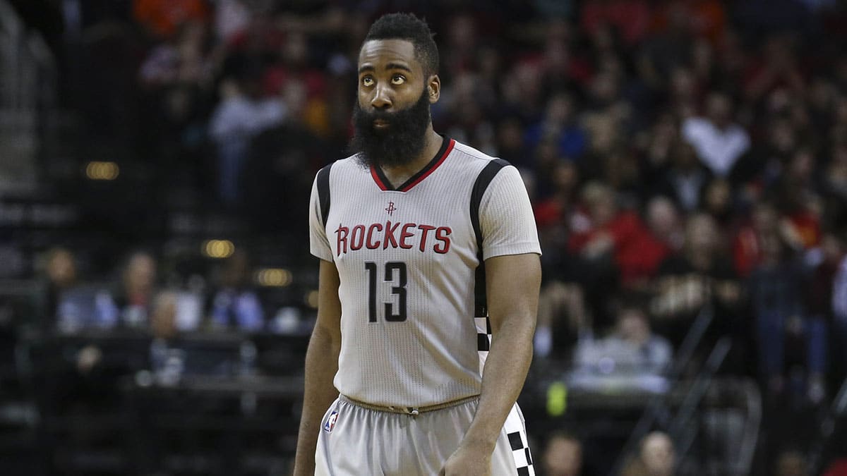 Houston Rockets guard James Harden (13) looks up after a play during the fourth quarter against the Memphis Grizzlies at Toyota Center. The Grizzlies defeated the Rockets 102-93