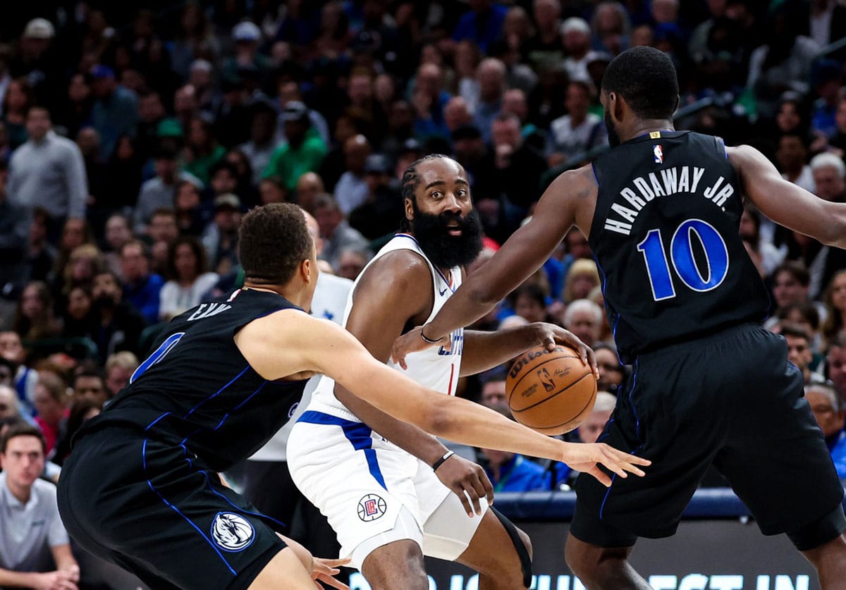 Clippers' James Harden guarded by Mavericks players in the 2023-24 regular season
