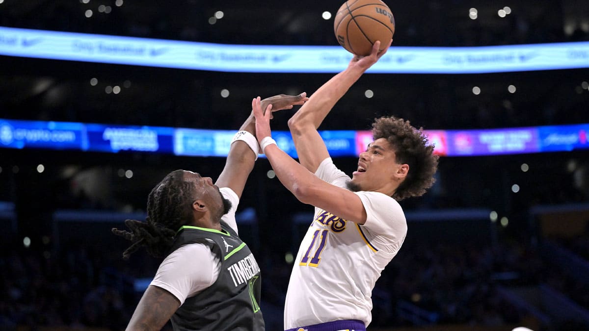Los Angeles Lakers center Jaxson Hayes (11) shoots over Minnesota Timberwolves center Naz Reid (11) in the first half at Crypto.com Arena