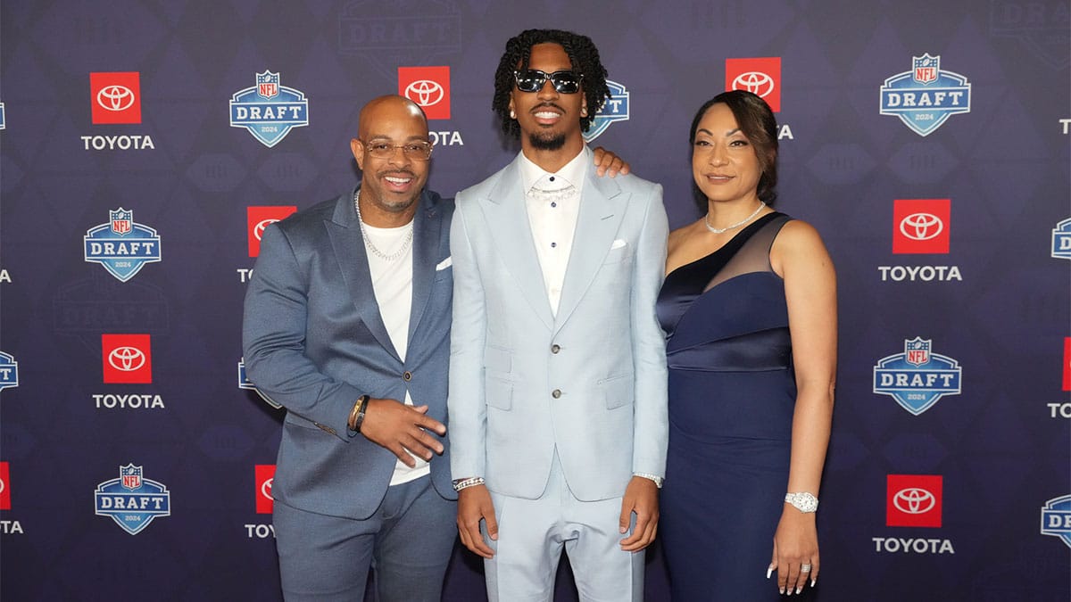 LSU Tigers quarterback Jayden Daniels stands on the red carpet ahead of the 2024 NFL Draft at Detroit’s Fox Theatre