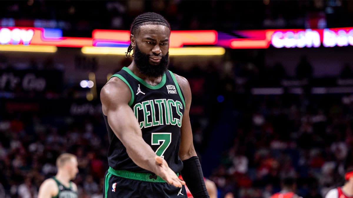 Boston Celtics guard Jaylen Brown (7) has a few words with the team attendant after he slips on the court against the New Orleans Pelicans during the first half at Smoothie King Center.