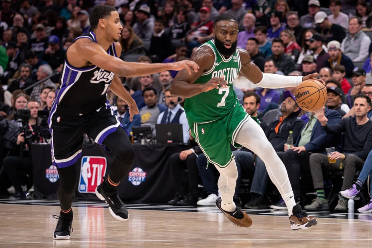 Boston Celtics guard Jaylen Brown (7) drives to the basket against Sacramento Kings forward Keegan Murray (13) during the fourth quarter at Golden 1 Center.