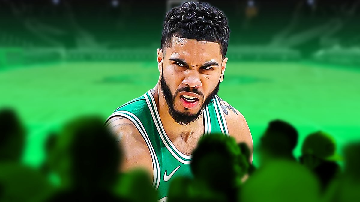 A fierce Celtics Jayson Tatum in front of a green TD Garden