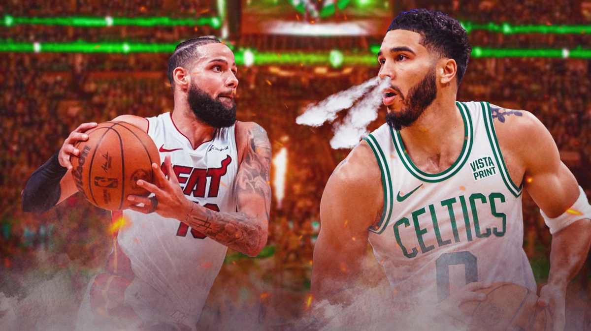 Jayson Tatum breathing smoke at Caleb Martin