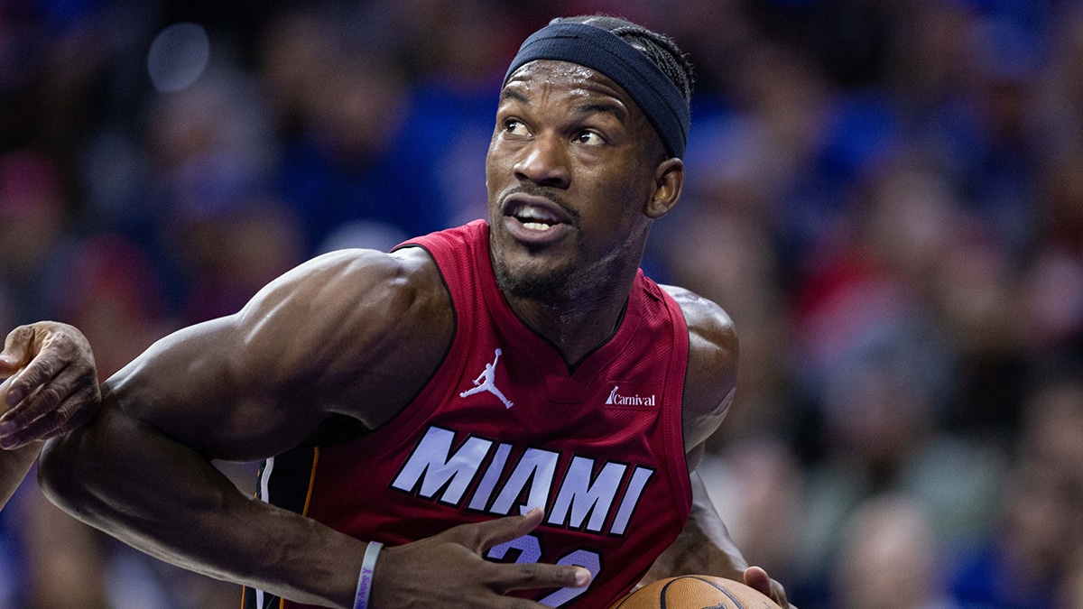 Miami Heat forward Jimmy Butler (22) drives against against the Philadelphia 76ers during the first quarter of a play-in game of the 2024 NBA playoffs at Wells Fargo Center.