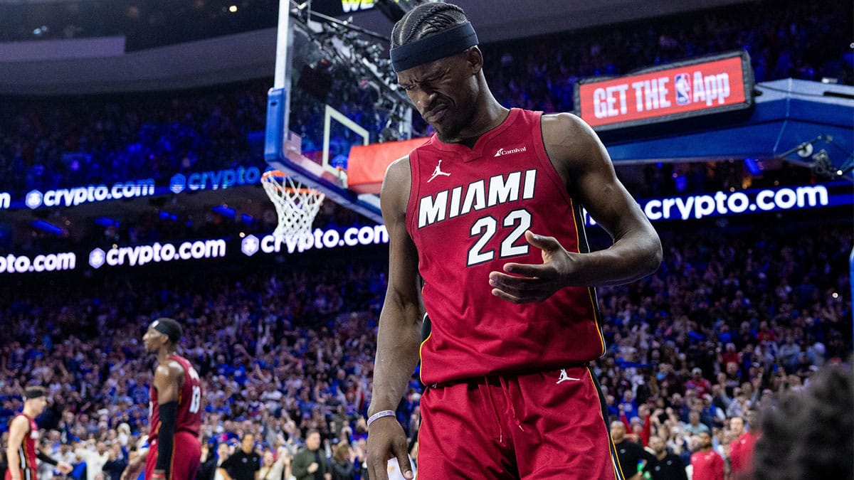 Miami Heat forward Jimmy Butler (22) reacts after a collision during the fourth quarter against the Philadelphia 76ers in a play-in game of the 2024 NBA playoffs at Wells Fargo Center.