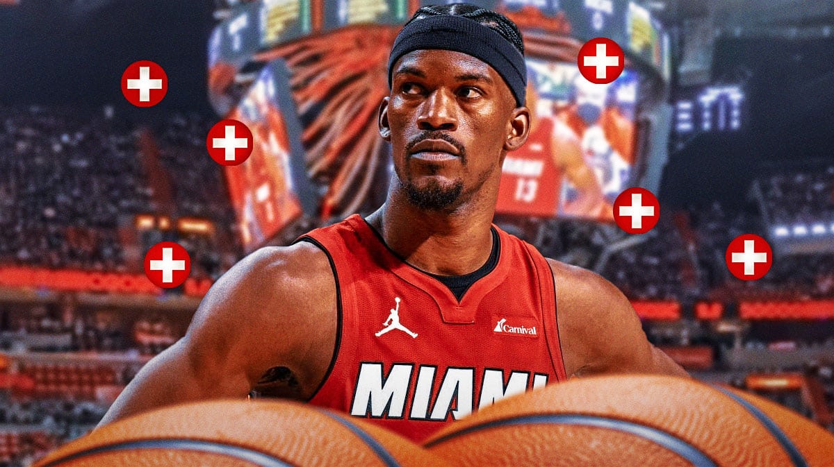 Miami Heat star Jimmy Butler with injury signs around him in front of the Kaseya Center.