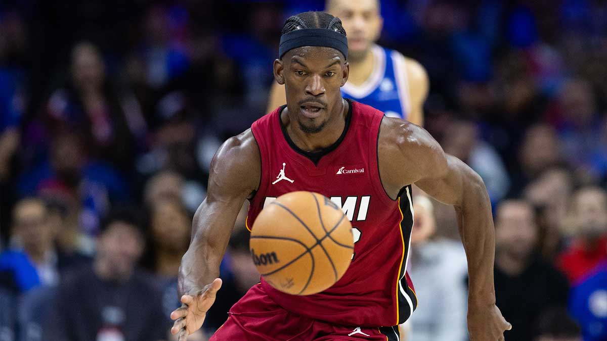 Miami Heat forward Jimmy Butler (22) picks up a loose ball against the Philadelphia 76ers during the second quarter of a play-in game of the 2024 NBA playoffs at Wells Fargo Center.