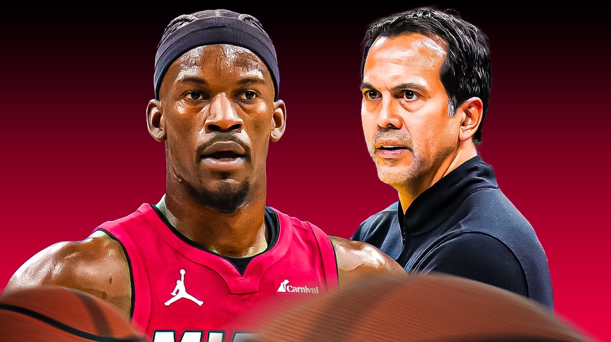 Miami Heat star Jimmy Butler next to head coach Erik Spoelstra in front of the Kaseya Center.