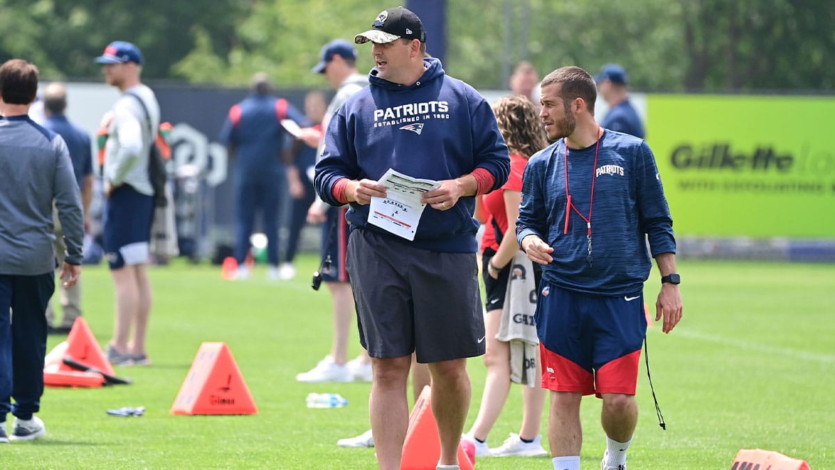 New England Patriots offensive assistant coach Joe Judge (center) watches over practice at the Patriots minicamp at Gillette Stadium.