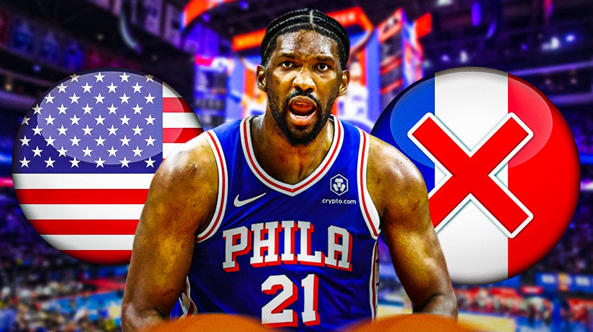 Philadelphia 76ers center Joel Embiid next to two crossed flags: one for the United States of America and the other for France