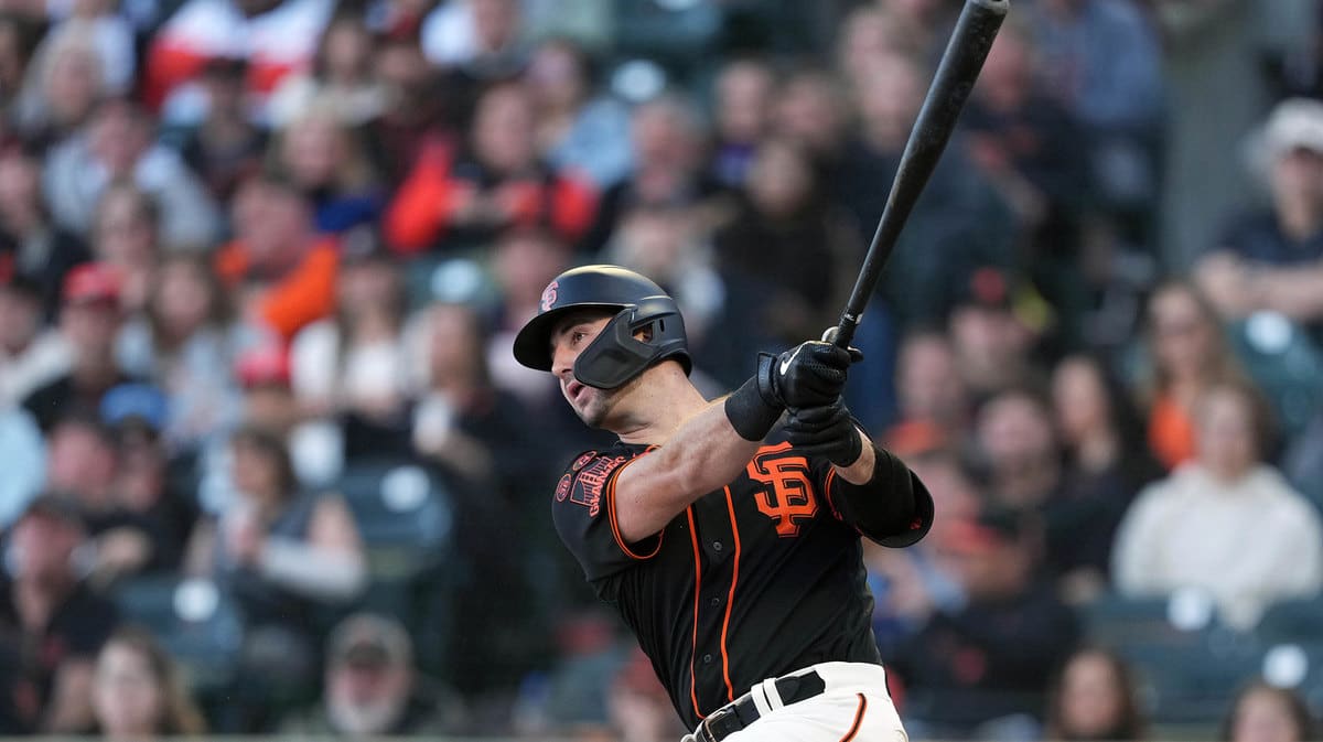 Giants catcher Joey Bart (21) bats during the second inning against the Colorado Rockies at Oracle Park