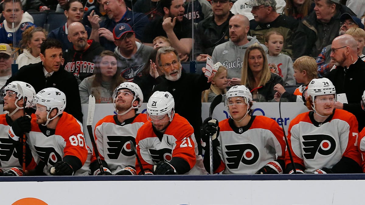 Philadelphia Flyers head coach John Tortorella directs players from the bench during the first period against the Columbus Blue Jackets at Nationwide Arena.