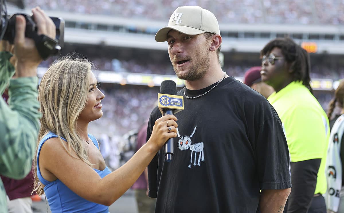 Former Texas A&M Aggies player Johnny Manziel is interviewed during the game between the Aggies and Louisiana Monroe Warhawks at Kyle Field.