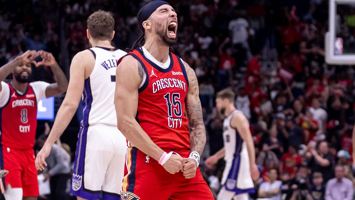 New Orleans Pelicans guard Jose Alvarado (15) reacts to making a three point basket against the Sacramento Kings in the second half during a play-in game of the 2024 NBA playoffs at Smoothie King Center