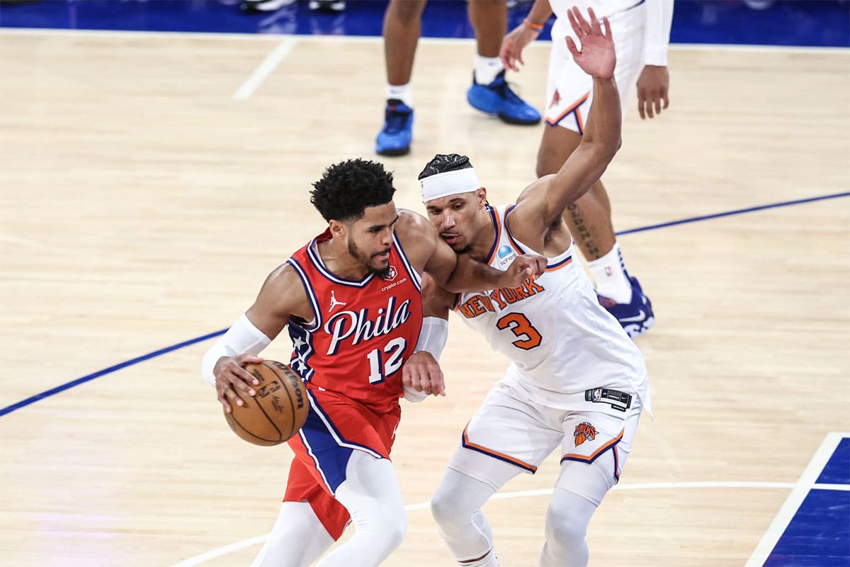 Philadelphia 76ers forward Tobias Harris (12) looks to drive past New York Knicks guard Josh Hart (3) in the fourth quarter in game one of the first round for the 2024 NBA playoffs at Madison Square Garden. 
