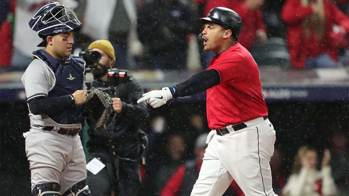 Cleveland Guardians first baseman Josh Naylor (22) celebrates as he steps on home plate after hitting a solo home run during the fourth inning of Game 4 of an American League Division baseball series against the New York Yankees at Progressive Field, Sunday, Oct. 16, 2022, in Cleveland, Ohio.