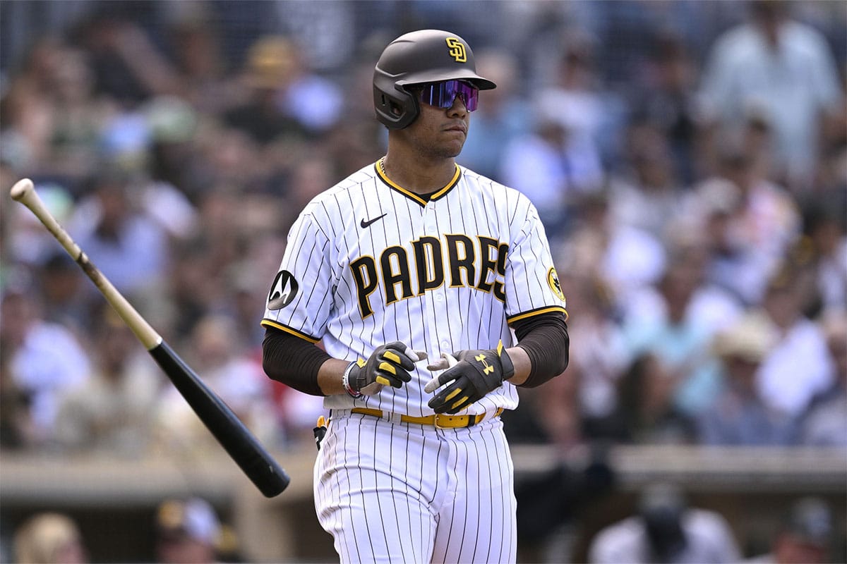 San Diego Padres left fielder Juan Soto (22) tosses his bat after a walk against the Colorado Rockies during the seventh inning at Petco Park