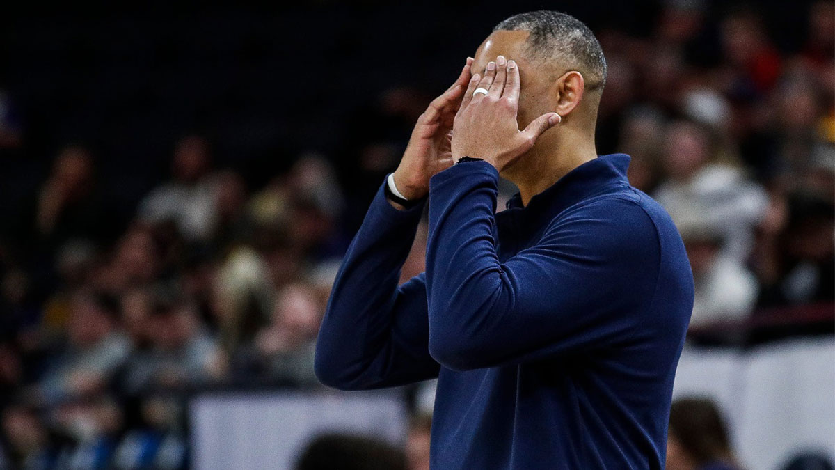 Michigan head coach Juwan Howard reacts to a play against Penn State during the second half of the First Round of Big Ten tournament at Target Center