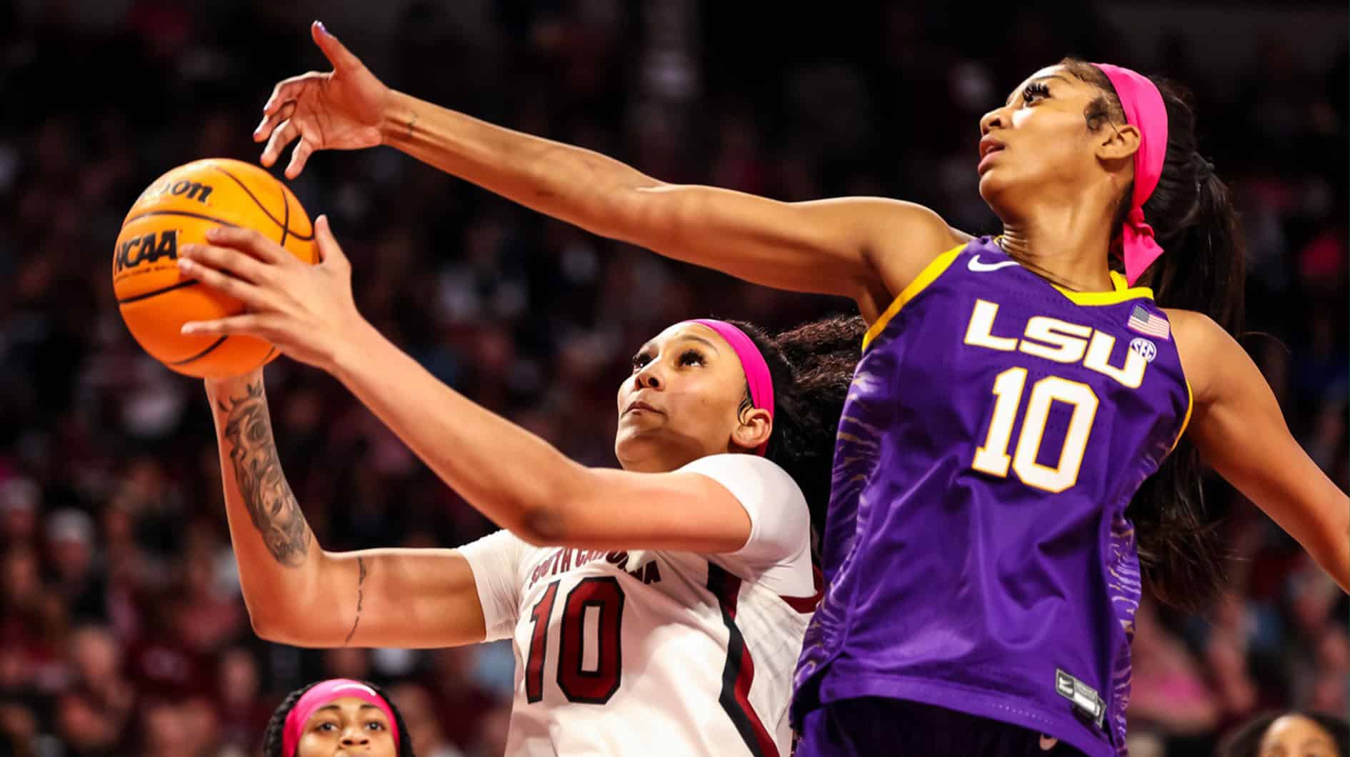South Carolina Gamecocks center Kamilla Cardoso (10) drives past LSU Lady Tigers forward Angel Reese (10) in the first half