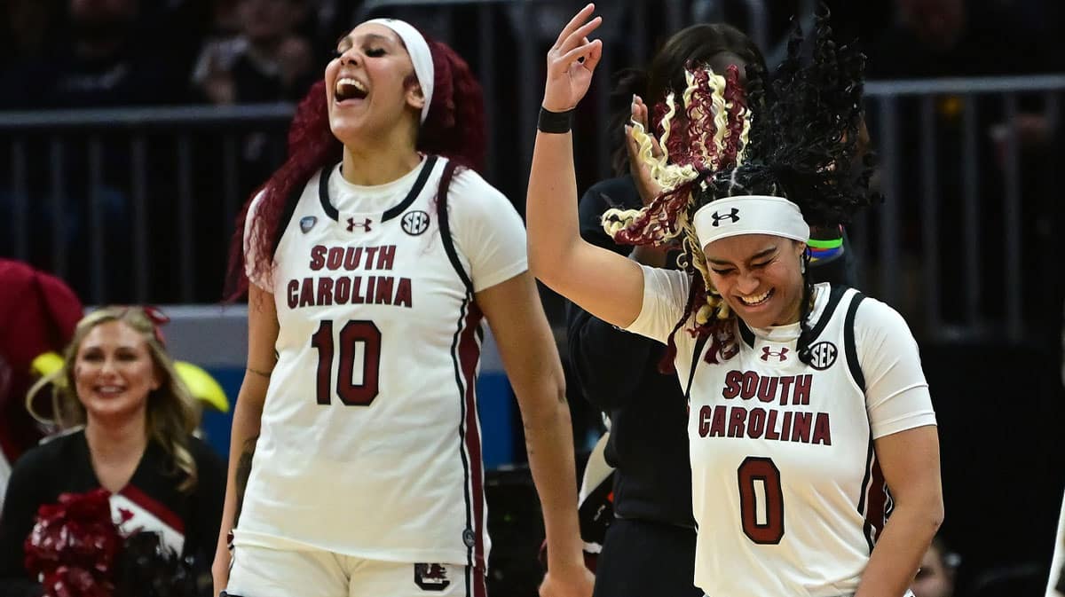 Apr 5, 2024; Cleveland, OH, USA; South Carolina Gamecocks center Kamilla Cardoso (10) and guard Te-Hina Paopao (0) react on the bench against the NC State Wolfpack in the semifinals of the Final Four of the womens 2024 NCAA Tournament at Rocket Mortgage FieldHouse
