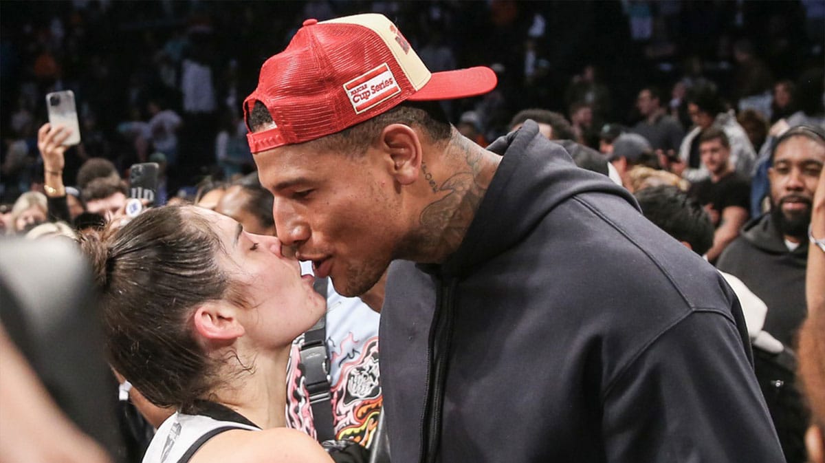 Las Vegas Aces guard Kelsey Plum (10) celebrates with her husband, New York Giants tight end Darren Waller, after winning the 2023 WNBA Finals.