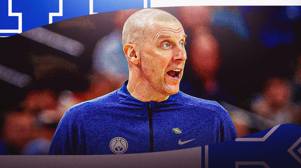 BYU coach Mark Pope stands in front of Kentucky basketball logo, Drew Scott, John Calipari sit in background