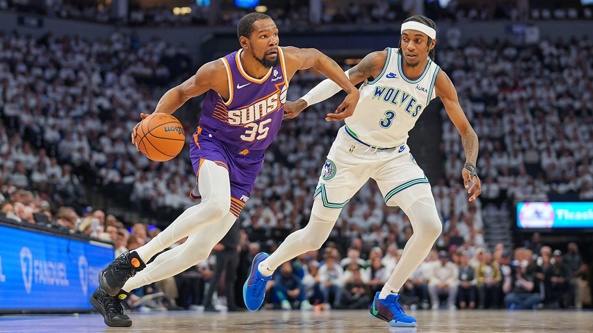 Phoenix Suns player Kevin Durant and Minnesota Timberwolves player Jaden McDaniels