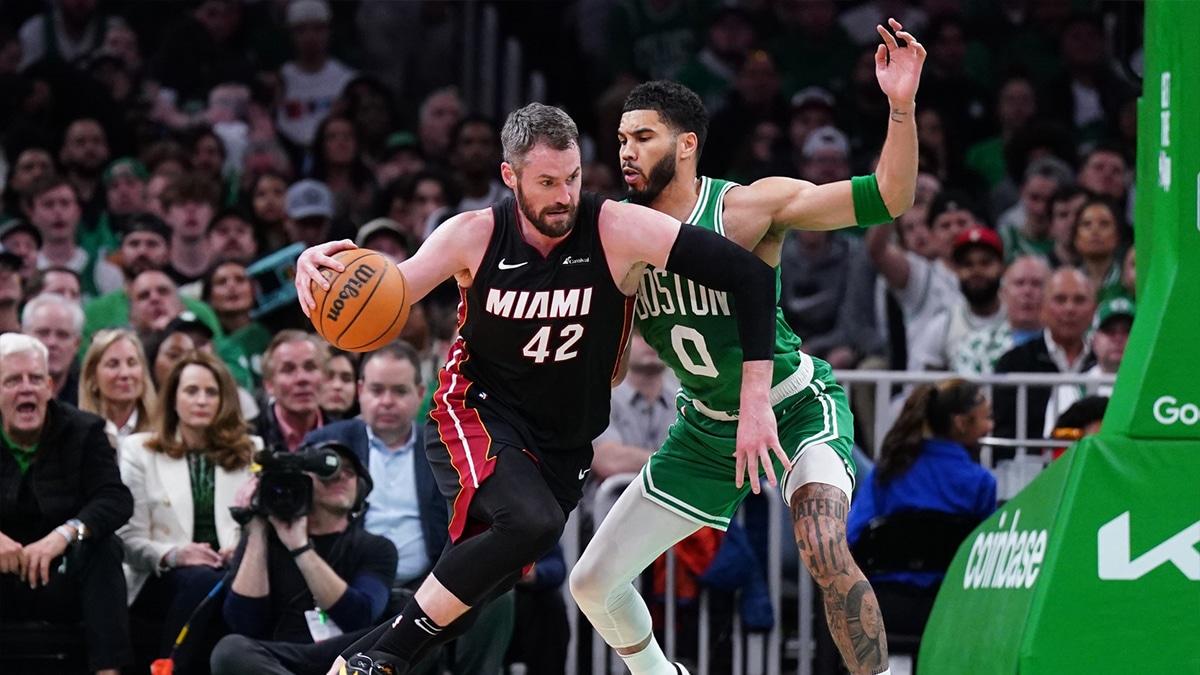 Boston Celtics forward Jayson Tatum (0) defends against Miami Heat forward Kevin Love (42) in the second quarter during game two of the first round for the 2024 NBA playoffs at TD Garden. 