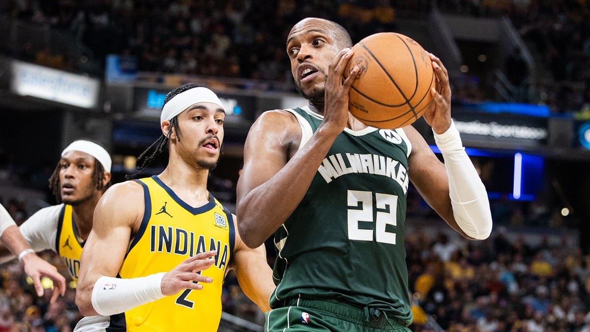 Milwaukee Bucks forward Khris Middleton (22) holds the ball while Indiana Pacers guard Andrew Nembhard (2) defends during game four of the first round for the 2024 NBA playoffs at Gainbridge Fieldhouse.