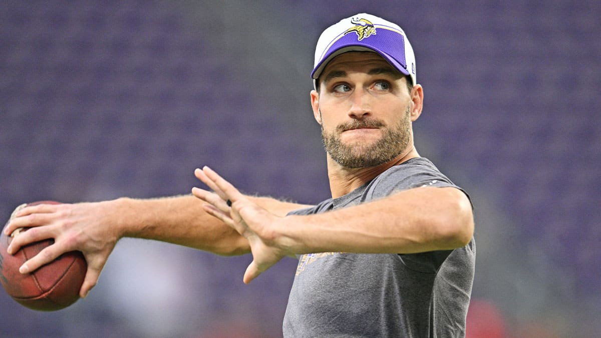 Minnesota Vikings quarterback Kirk Cousins (8) warms up before the game against the San Francisco 49ers at U.S. Bank Stadium
