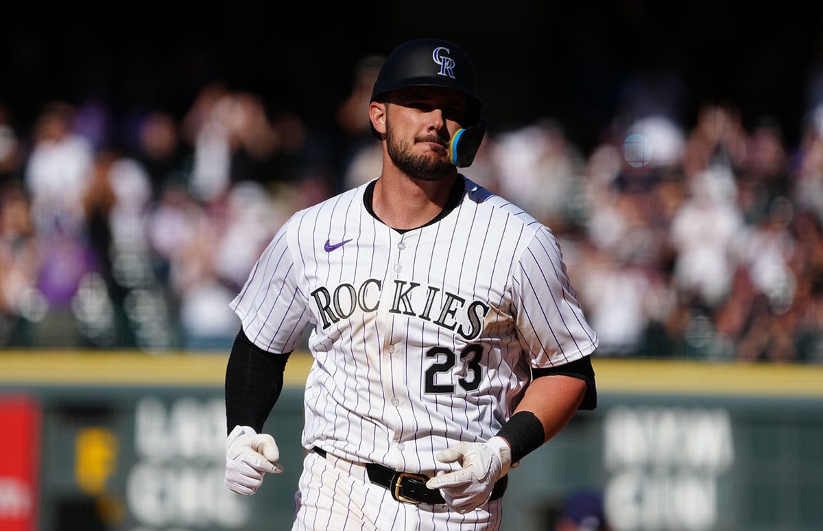 Colorado Rockies outfielder Kris Bryant (23) runs off a two run home run in the sixth inning against the Tampa Bay Rays at Coors Field.