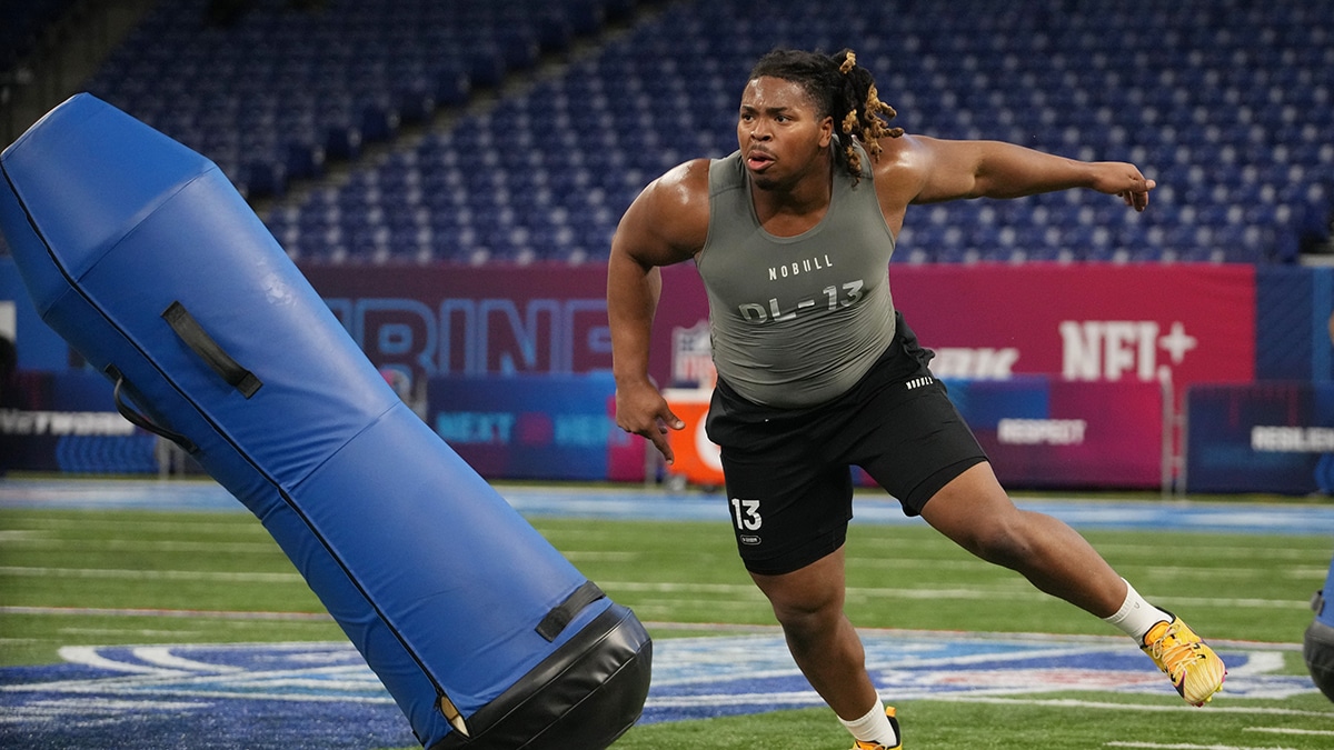 Michigan defensive lineman Kris Jenkins (DL13) works out during the 2024 NFL Combine at Lucas Oil Stadium