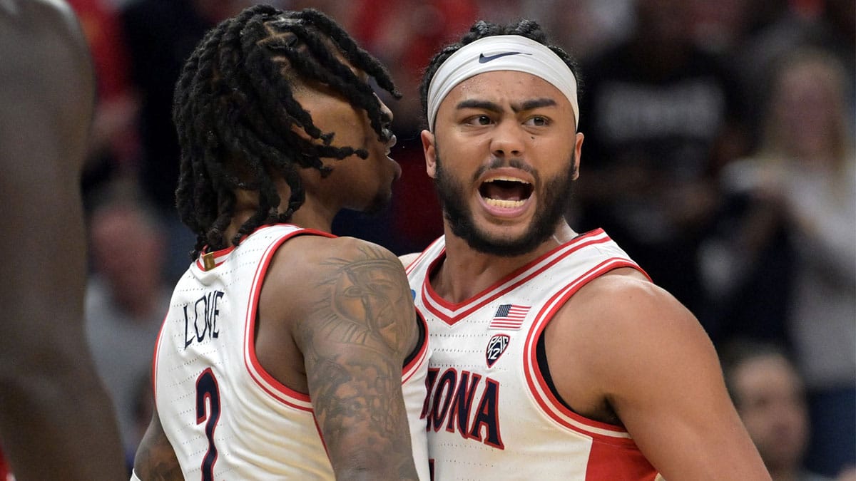 Arizona Wildcats guard Kylan Boswell (4) and guard Caleb Love (2) react in the second half against the Clemson Tigers in the semifinals of the West Regional of the 2024 NCAA Tournament at Crypto.com Arena.