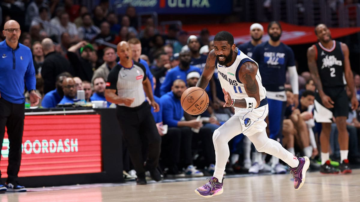 Dallas Mavericks guard Kyrie Irving (11) dribbles the ball during the third quarter of game two of the first round for the 2024 NBA playoffs against the Los Angeles Clippers at Crypto.com Arena.