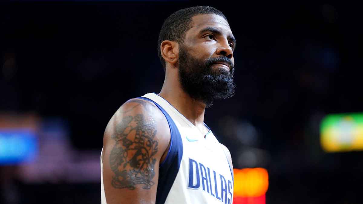 Dallas Mavericks guard Kyrie Irving (11) stands on the court against the Golden State Warriors before the start of the second quarter at the Chase Center. 