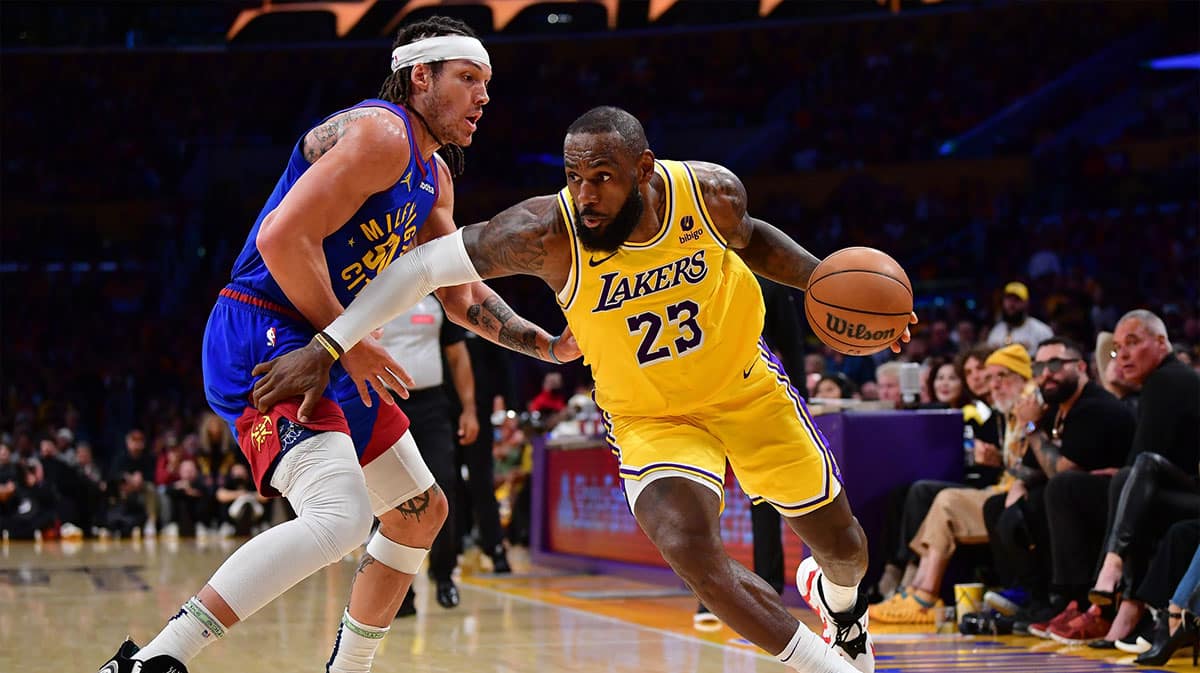 Los Angeles Lakers forward LeBron James (23) moves to the basket against Denver Nuggets forward Aaron Gordon (50) during the second half in game three of the first round for the 2024 NBA playoffs at Crypto.com Arena. 