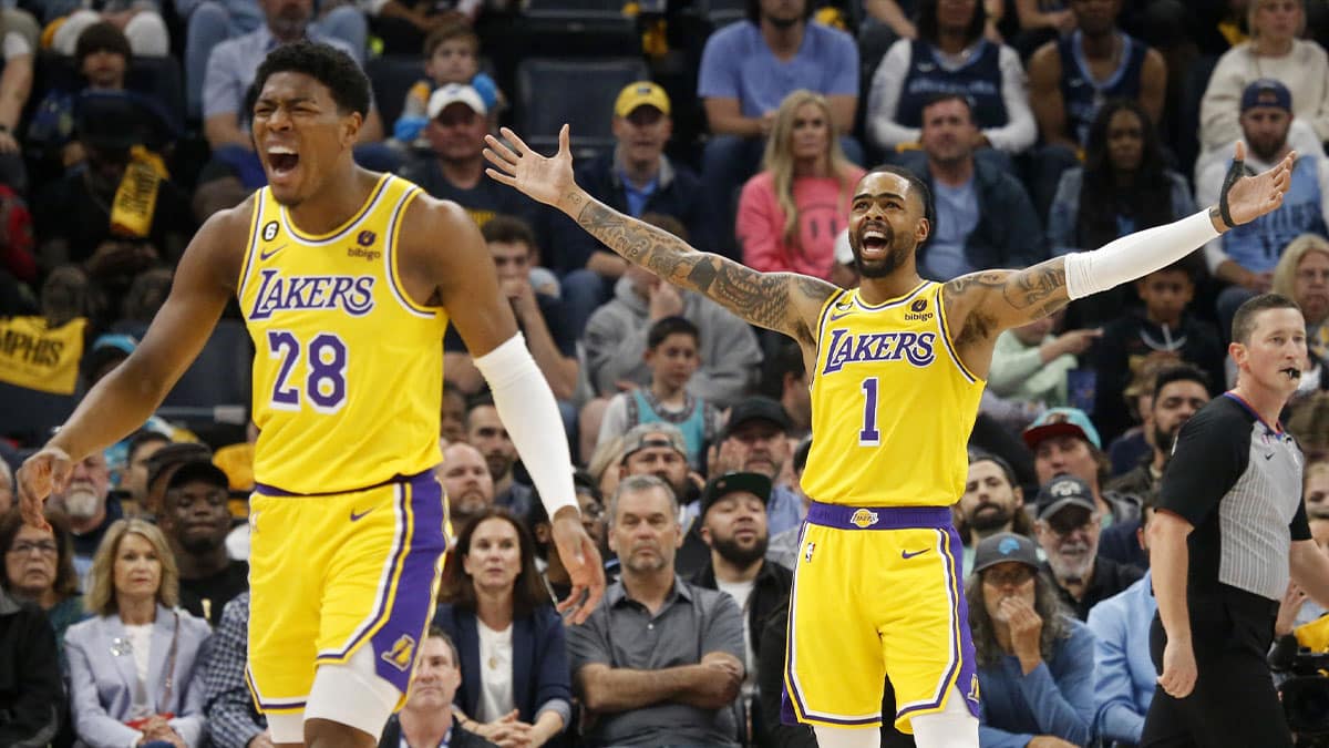 Lakers forward Rui Hachimura (28) and Los Angeles Lakers guard D'Angelo Russell (1) react