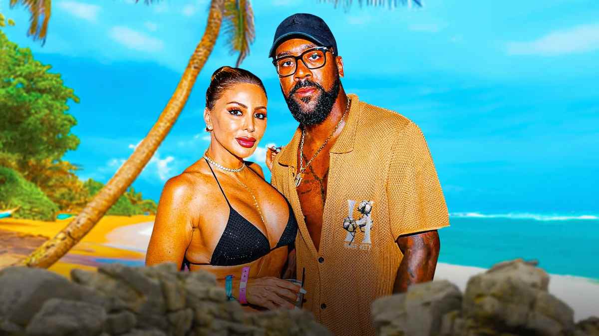 Larsa Pippen, Marcus Jordan with beach behind them