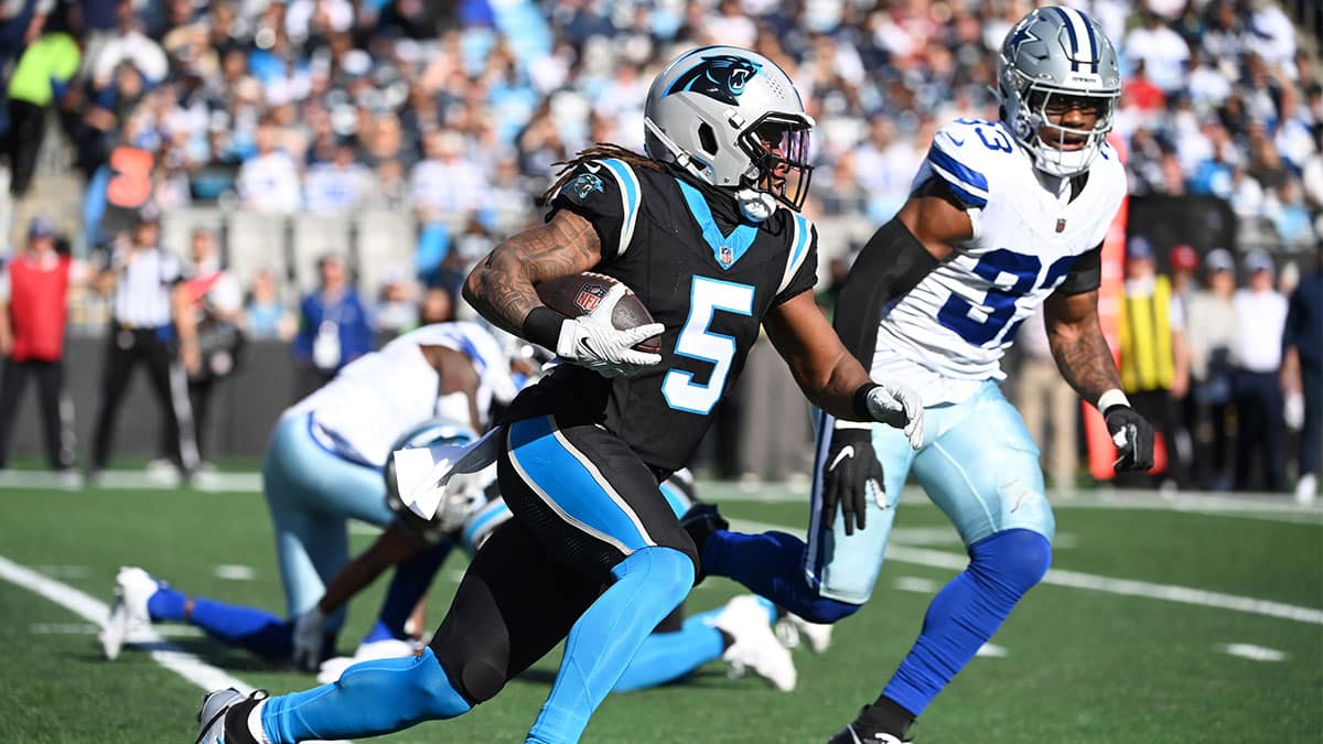 Carolina Panthers wide receiver Laviska Shenault Jr. (5) with the ball as Dallas Cowboys wide receiver Jalen Brooks (83) defends in the second quarter at Bank of America Stadium