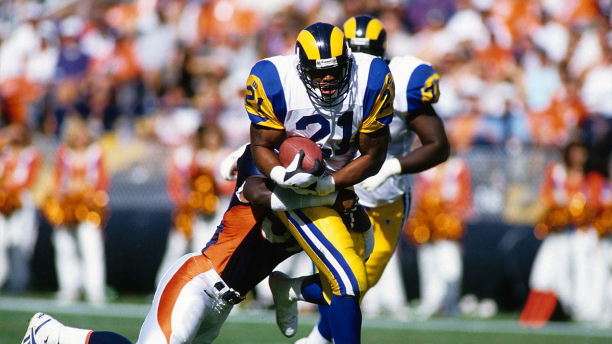 Lawrence Phillips running the football on the Rams