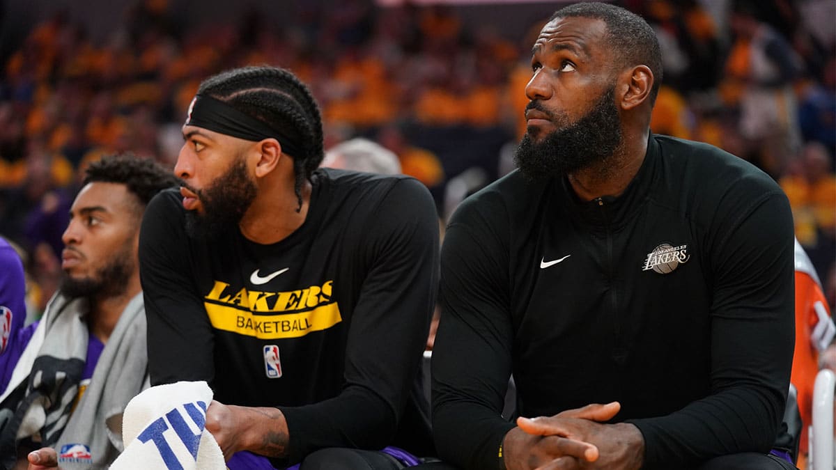 Los Angeles Lakers forward Anthony Davis (3) and forward LeBron James (6) sit on the bench during action against the Golden State Warriors in the fourth quarter during game two of the 2023 NBA playoffs at the Chase Center.