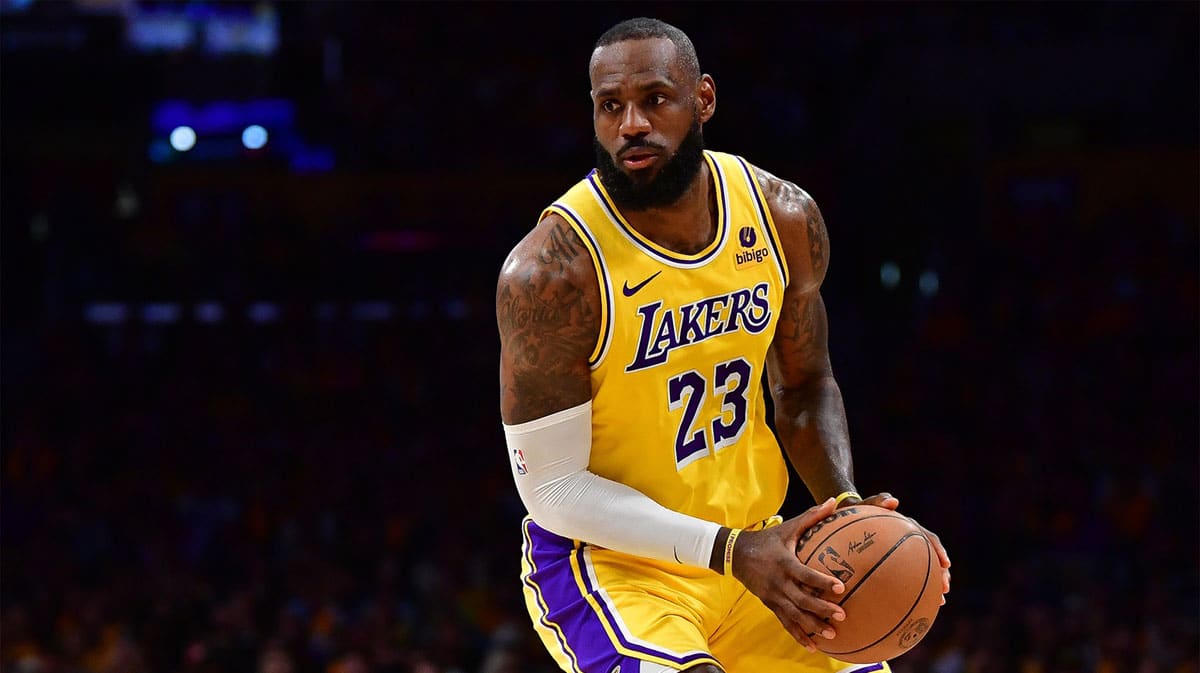 Los Angeles Lakers forward LeBron James (23) controls the ball against the Denver Nuggets during the second half in game three of the first round for the 2024 NBA playoffs at Crypto.com Arena.