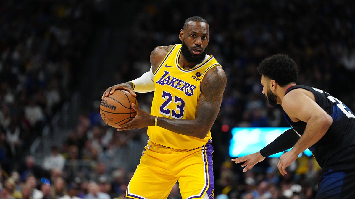 Los Angeles Lakers forward LeBron James (23) and Denver Nuggets guard Jamal Murray (27) in the first quarter during game two of the first round for the 2024 NBA playoffs at Ball Arena.