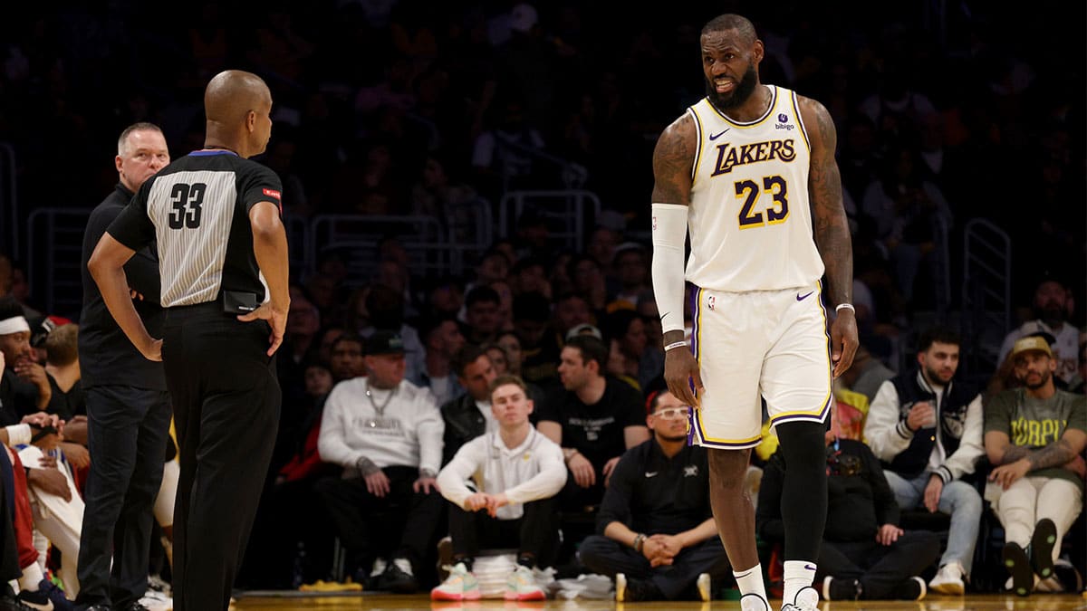 Los Angeles Lakers forward LeBron James (23) talks to referee Sean Corbin (33) during the second quarter in game four of the first round for the 2024 NBA playoffs against the Denver Nuggets at Crypto.com Arena