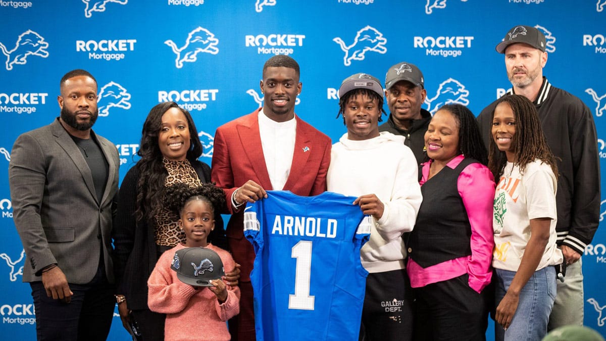 Lions first-round NFL draft pick Terrion Arnold poses for a photo with his family at the introductory press conference at Detroit Lions headquarters and training facility in Allen Park on Friday, April 26, 2024.