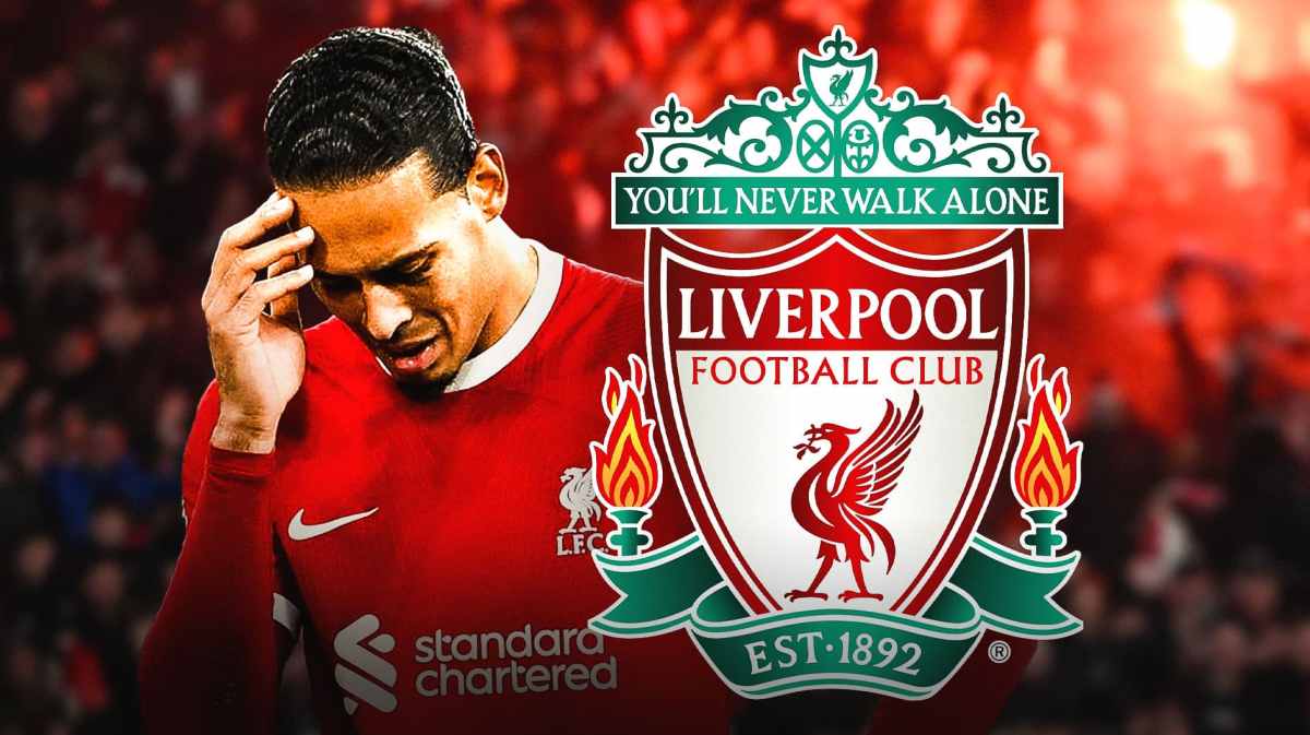 Virgil van Dijk looking down/sad in front of the Liverpool logo