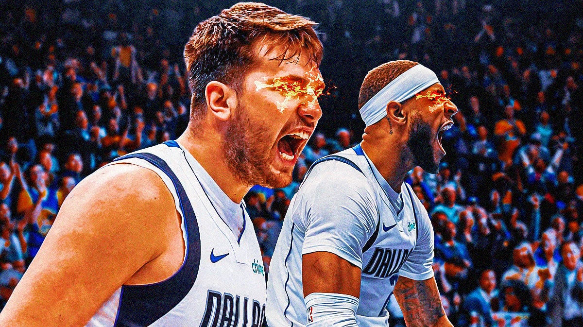 Mavericks' Luka Doncic, Mavericks' Daniel Gafford both with fire in eyes.