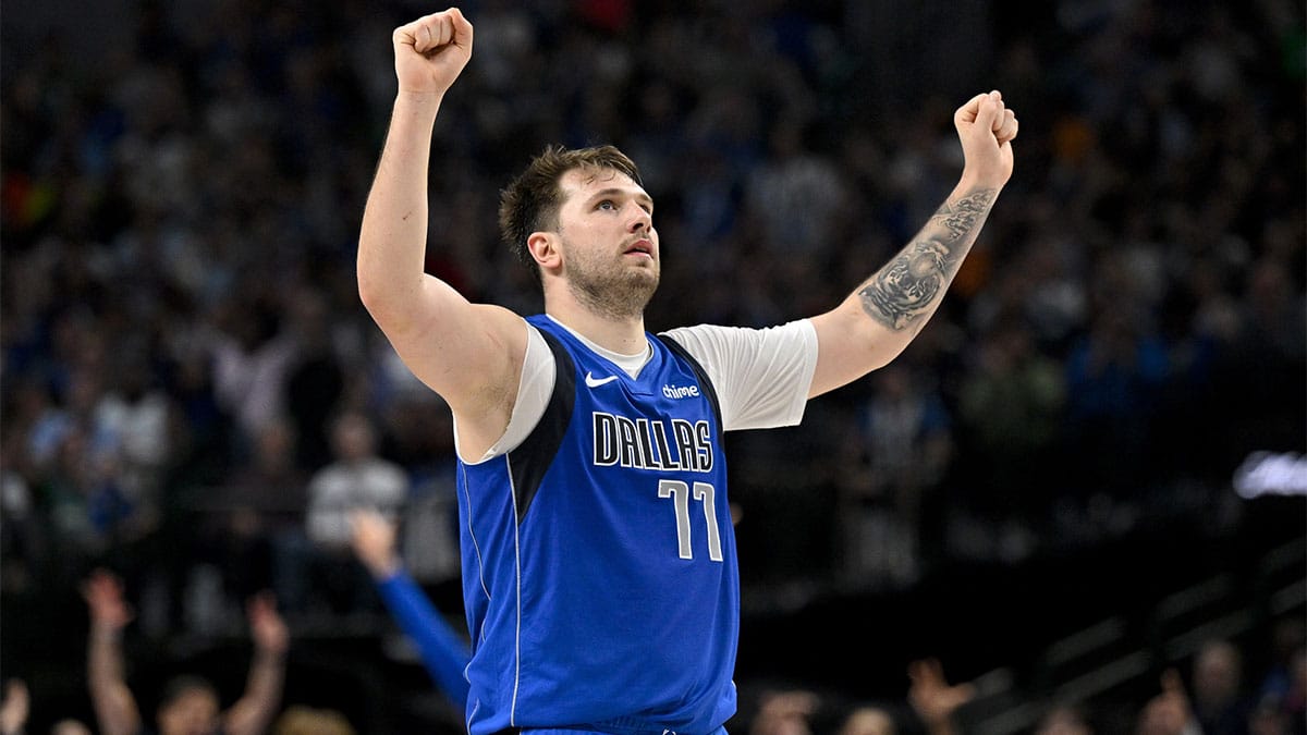 Dallas Mavericks guard Luka Doncic (77) celebrates during the second half against the Atlanta Hawks at the American Airlines Center.