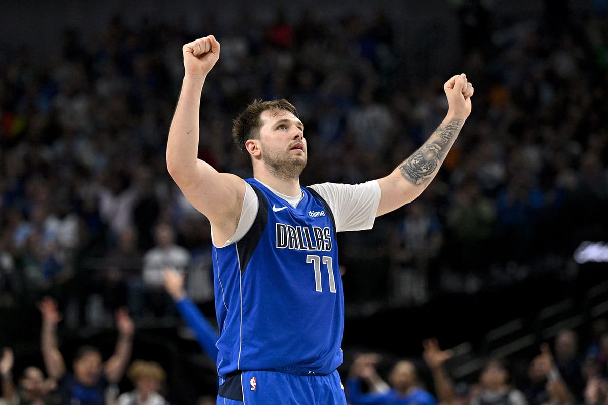 Dallas Mavericks guard Luka Doncic (77) celebrates during the second half against the Atlanta Hawks at the American Airlines Center.
